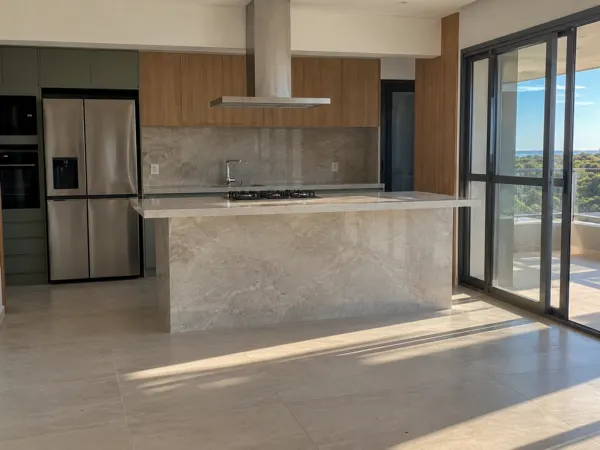 Cocina integrada al living con barra